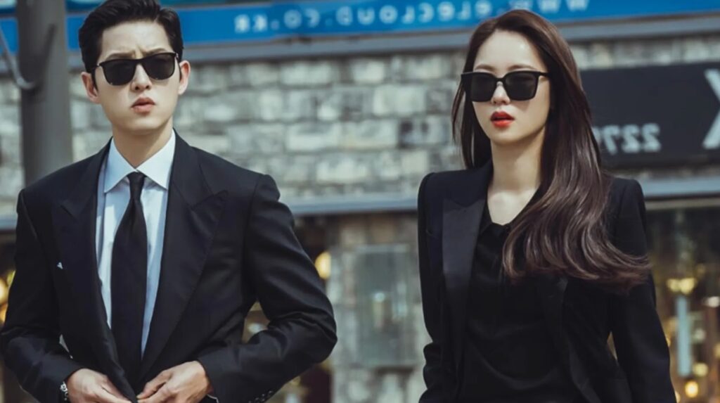 The main leads from Vincenzo Korean drama walking in a mafia style by wearing glasses