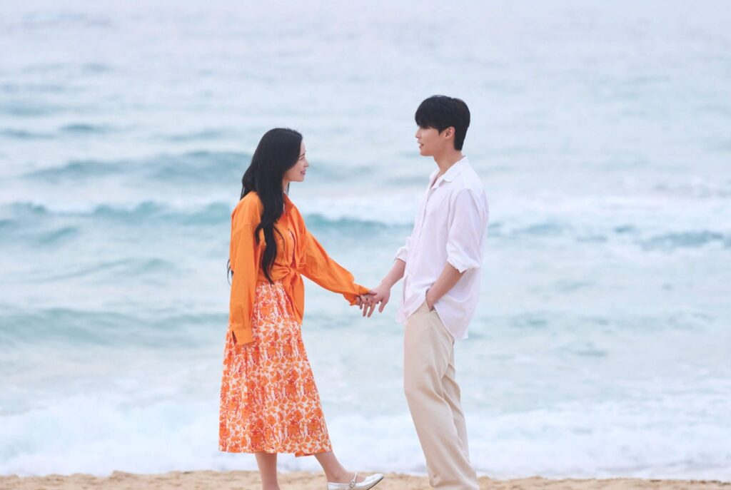 The romantic moment between the main leads in My Royal Nemesis where both of them are standing and enjoying on beech