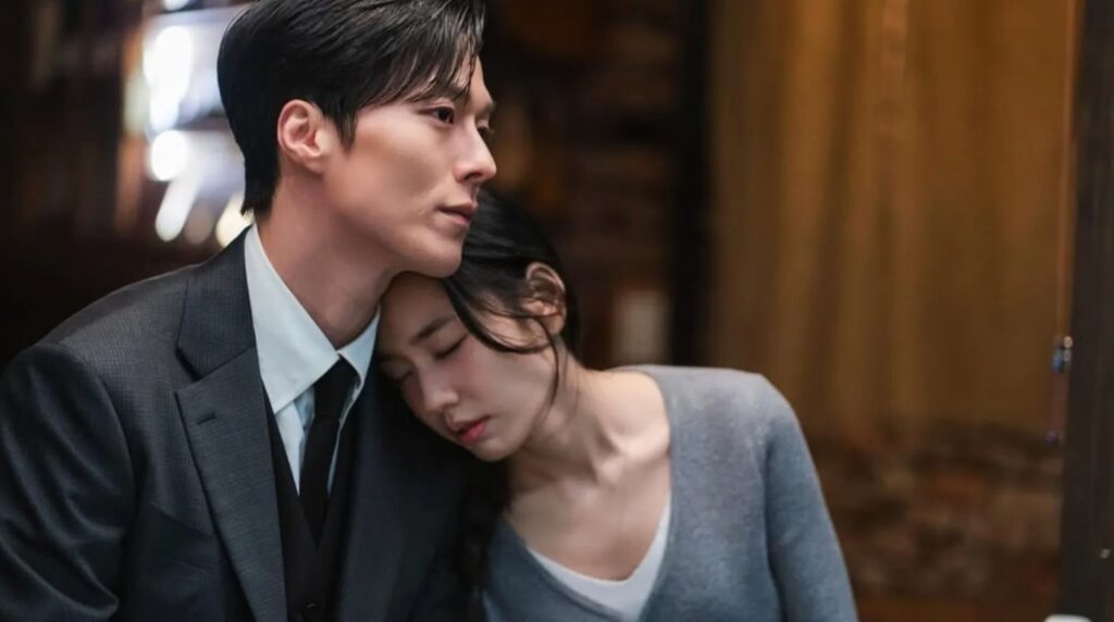 The main female lead is putting her head on the shoulder of male lead and  is sleeping in the Dynamite Kiss